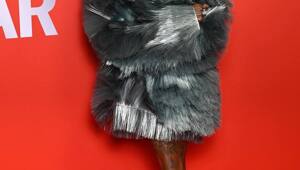 Синтия Эриво, Том Хиддлсон с Зави Эштон и Хиро Файнс Тиффин на красной  дорожке церемонии награждения British GQ Men of the Year Award