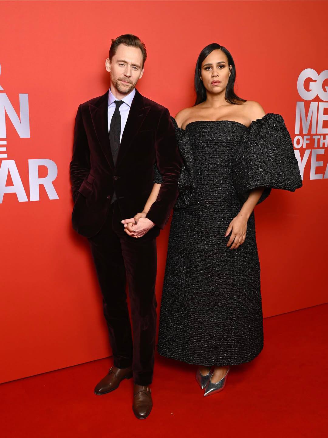 Синтия Эриво, Том Хиддлсон с Зави Эштон и Хиро Файнс Тиффин на красной  дорожке церемонии награждения British GQ Men of the Year Award